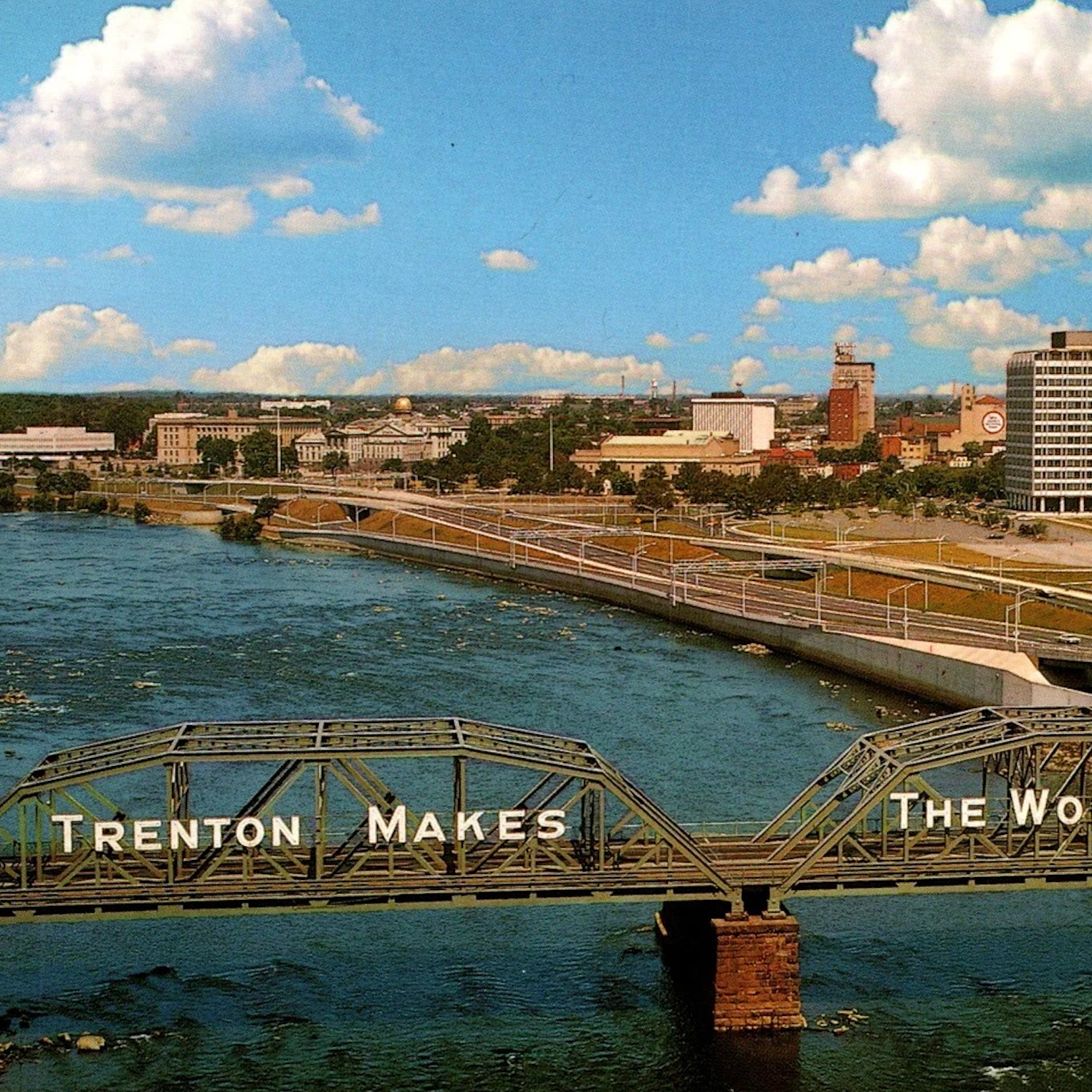 A vintage post card of a bridge that shows "Trenton Makes", referencing Trenton NJ's slogan "Trenton Makes, The World Takes"
